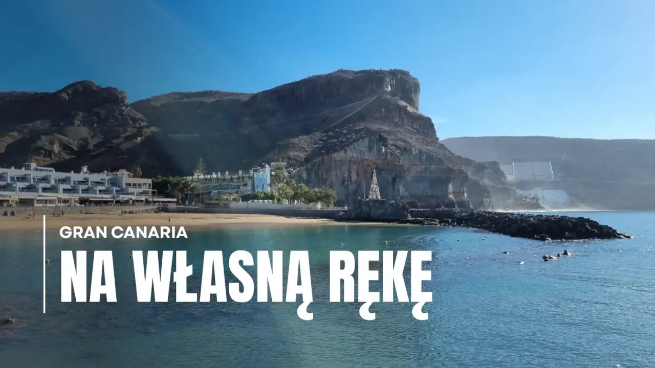 Gran Canaria: wybrzeże z hotelami i klifami, woda i kamienna falochron. Idealne miejsce na wakacje na własną rękę.