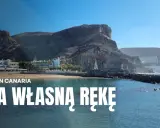 Gran Canaria: wybrzeże z hotelami i klifami, woda i kamienna falochron. Idealne miejsce na wakacje na własną rękę.