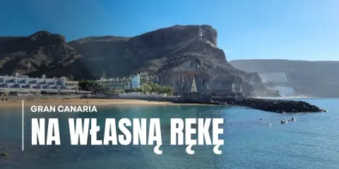 Gran Canaria: wybrzeże z hotelami i klifami, woda i kamienna falochron. Idealne miejsce na wakacje na własną rękę.