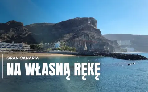 Gran Canaria: wybrzeże z hotelami i klifami, woda i kamienna falochron. Idealne miejsce na wakacje na własną rękę.
