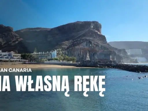 Gran Canaria: wybrzeże z hotelami i klifami, woda i kamienna falochron. Idealne miejsce na wakacje na własną rękę.